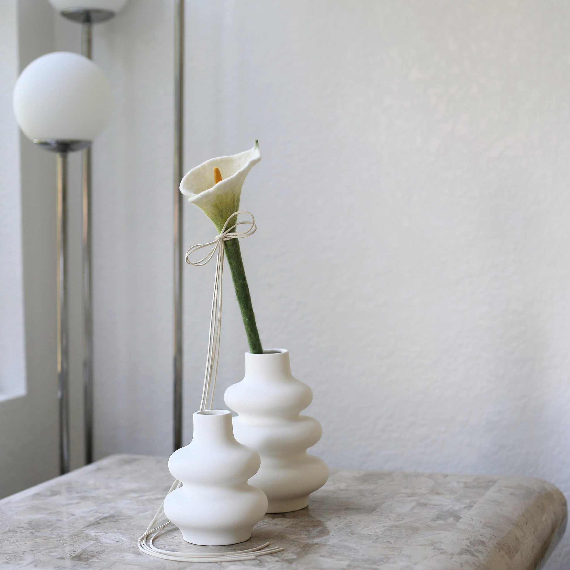 calla lily aesthetic cat toy teaser wand in minimalist vase in modern minimalist home by catenary home modern cat furniture company