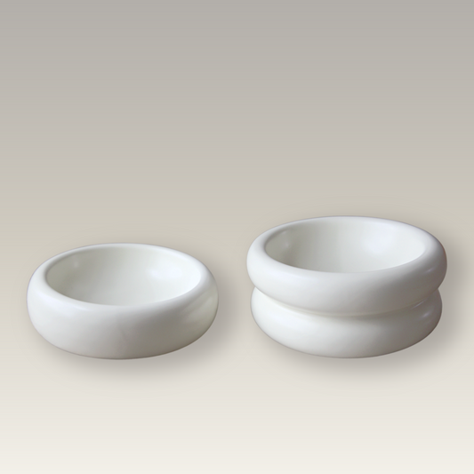 catenary set of two halo ceramic cat bowls, one elevated and one traditional against beige background